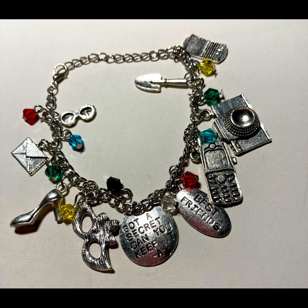 Silver charm bracelet #771 previously owned